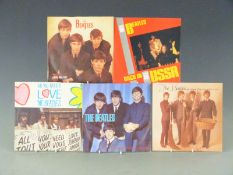 The Beatles - 23 singles, later issues including picture covers, two picture discs and solo records