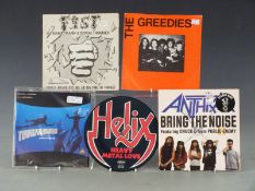 Approximately 100 singles, including Punk, New Wave and Rock