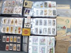 Six albums of cigarette cards to include Wills Cricketers, Old Inns, Butterflies and Moths,