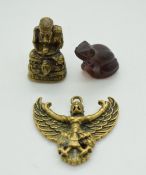 Two brass Oriental models and a glass frog