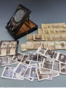 A lacquered portable stereoscopic viewer with a quantity of cards including Tynemouth and