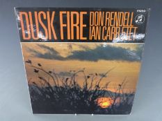 Don Rendell/Ian Carr - Dusk Fire (SX6064), black/silver/white label from late 1960's early 1970's,