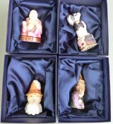 Four boxed Royal Worcester candle snuffers comprising Smiling Buddha, Bottom, Nelson Teddy and a