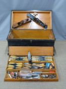 19th or early 20thC woodworking tool chest with three sliding trays, contents include wood carving