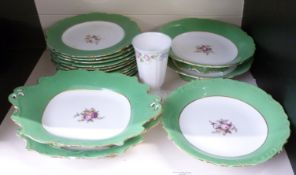 19thC dessert service hand decorated with flowers, including four tazzas and 11 plates