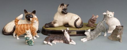 A collection of Beswick cat figures including 