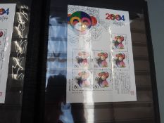 Two stockbooks of modern Chinese and Russian stamps and mini sheets