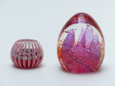 Peter McDougall glass paperweight with red and white latticino rods and central millefiori canes,