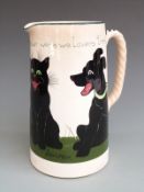 The Bristol Cat and Dog Pottery large jug hand painted with a cat and dog scene entitled 'I wonder