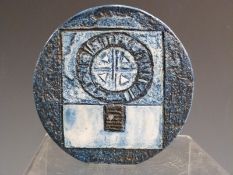 Troika wheel vase on blue ground, H12cm