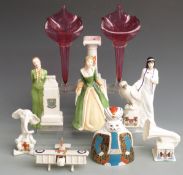 Three Aynsley figurines, Crown Derby paperweight, Royal Crown Derby Persian Cat, crested ware