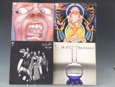 Approximately 100 albums including Alice Cooper, Cream, The Beatles, Focus, Uriah Heap, Alan