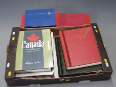 A quantity of stockbooks, albums, loose album pages etc