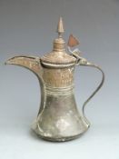 A late 19th/ early 20thC dallah, H30cm.