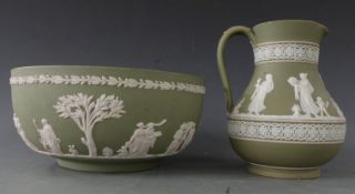 A 19/20thC Wedgwood green Jasperware jug and bowl decorated with classical figures, H16cm,