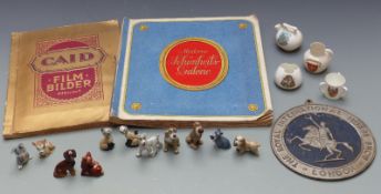 Royal International Horse Show aluminium plaque, two albums of film star cards, dogs, crested ware