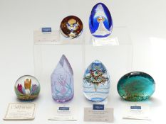 Six Caithness limited edition glass paperweights including Dolphin Duet, Symphony, Hibernation