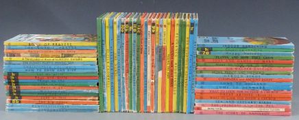 Collection of vintage Ladybird books including Three Little Pigs, Piggly Plays Truant, Bob Bushtail,