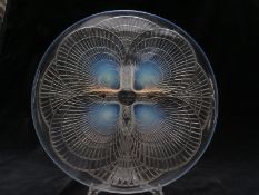 Lalique Coquilles opalescent glass charger decorated with shells forming four feet, signed to