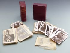 A collection of postcards, stage / glamour in two leather bound picture postcards boxes framed as