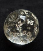 A multi faceted glass teetotem numbered from 00 to 30, 28mm in diameter