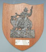 An 18thC lead fire mark insurance plaque for London Assurance, mounted on oak shield with attached