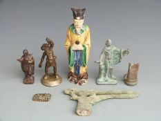 Egyptian amulet, brass figures, bronze age style miniature axe head etc., tallest 21cm
