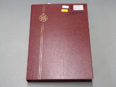 A stockbook of mainly mint GB, including blocks, booklets, inverted watermarks etc