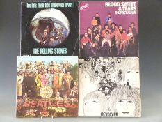 Approximately 30 albums including The Beatles (9)