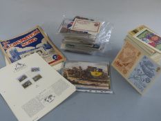 A box of PHQ cards, covers, loose stamps, postcards etc
