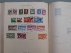 George VI stamp album of mint and used stamps, some high value including Hong Kong RSW set