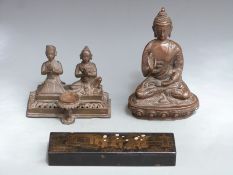 A bronze sculpture of Buddha, two praying figures, a reclining Buddhist figure etc, tallest 18cm