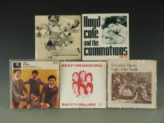 Approximately 250 singles from the 1970's and 1980's