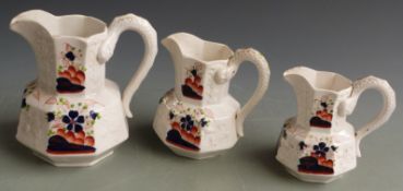 Bristol/ Pountney pottery three graduated jugs, tallest 19cm