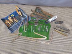 Collection of woodworking tools including carving chisels by Ward, Woodcock, Addis, Marples,