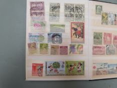 An album of modern GB stamps mint and used and two stockbooks of Commonwealth stamps