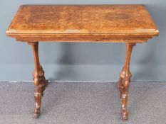 19th century burr walnut fold over games table raised on carved legs, size when folded L91 x D46 x
