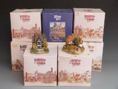 Eight Lilliput Lane cottages, in boxes