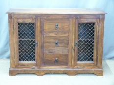 An Eastern hardwood sideboard with three drawers and decorative ironwork doors, W12 x D41 x H81cm