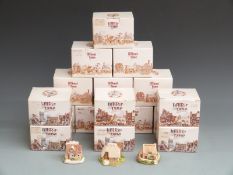 Sixteen Lilliput Lane cottages in boxes