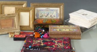 A collection of Eastern boxes, vizagapatam picture frames and textiles