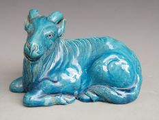 Chinese glazed pottery figure of a goat, H13cm