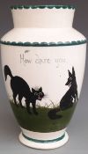 Bristol / Pountney pottery vase decorated with a cat and dog scene entitled 'How Dare You', with