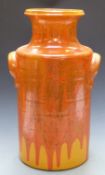 Retro large vase in the form of a milk churn decorated in a hot lava style, 'Canada' to base, H50cm