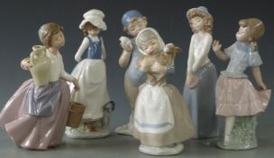 Six Nao figurines, girls with animals. horses etc, tallest 14cm