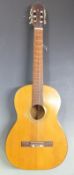 Acoustic guitar, unlabelled neck with steel reinforced rod, nylon strings and soft case
