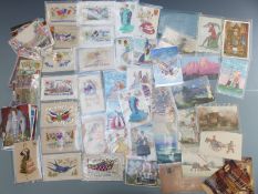 A small collection of postcards including WWI silks and embroidered Spanish girls wearing