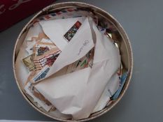 A box of loose stamps and covers
