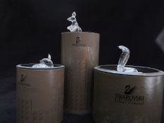 Three Swarovski Crystal cut glass animals comprising Deer/ Fawn 7608, Cobra Snake 243979 and