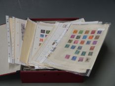 A box file of USA, South America, Asia and other stamps on loose album pages